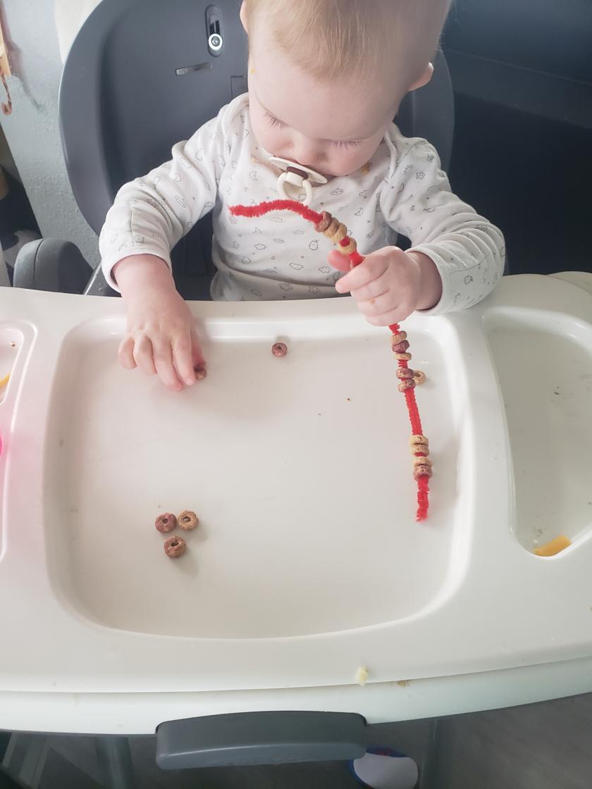 Monthly sensory bucket with age-appropriate toys.